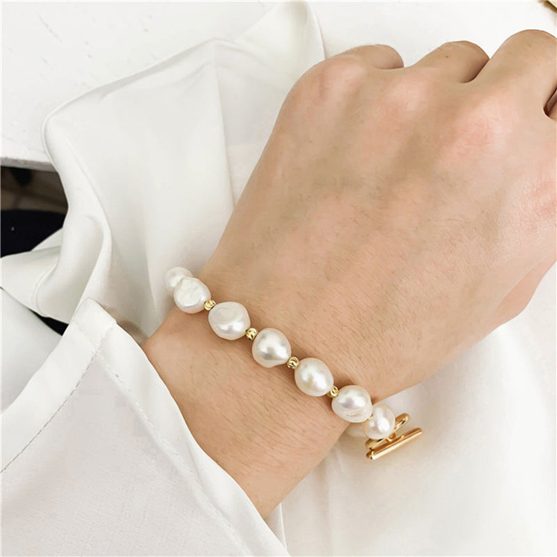Goldenes Perlenarmband für Damen mit echter Süßwasserperle